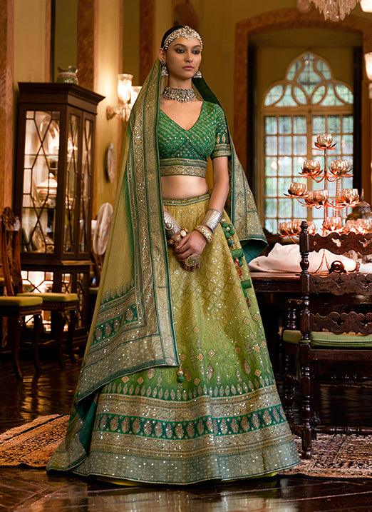 Affectionate Green Bridal Lehenga Choli with Sparkle & Mirror Work in Smooth Rajwadi Silk Choice