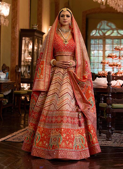 Affectionate Orange Bridal Lehenga Choli with Sparkle & Mirror Work in Smooth Rajwadi Silk Factory Outlet