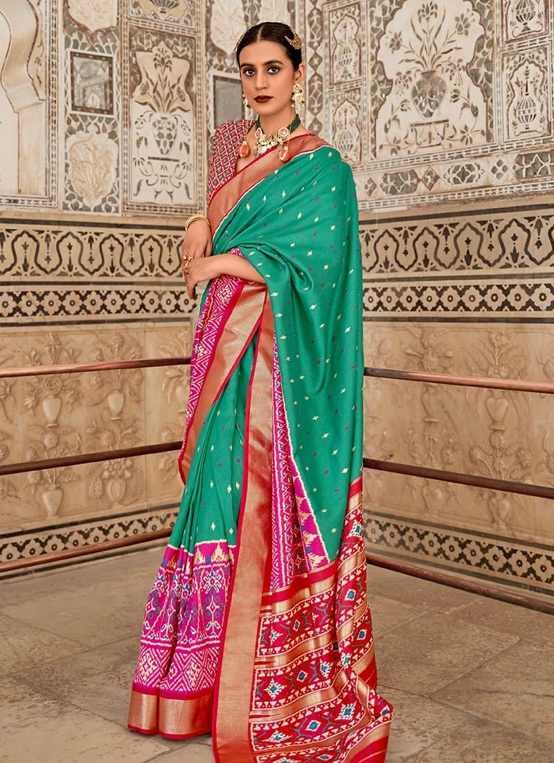 Patola Silk Fabric Sea Green Color Saree With V Neck Blouse Limited Edition