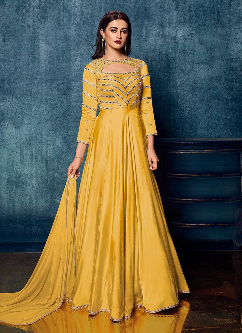 Yellow Color Satin Fabric Partywear Gown With Mirror Work Order Online